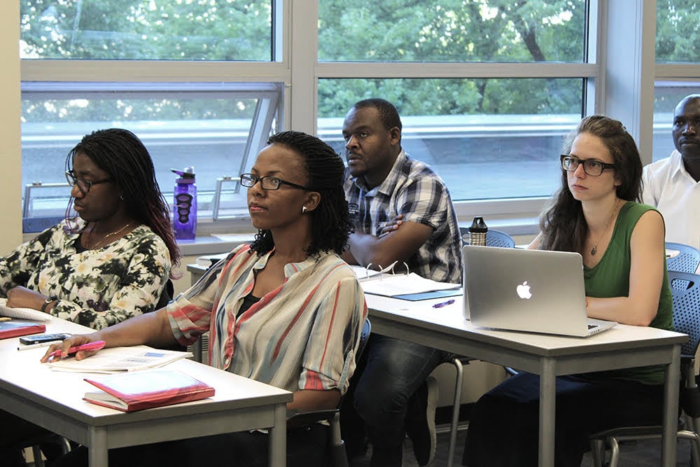 Graduate students in a classroom.