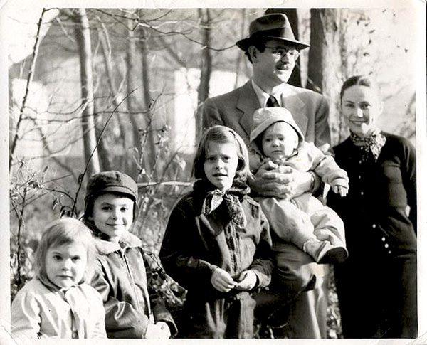 Vintage photo of a man and woman with four children.